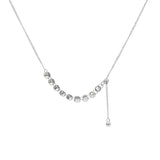 Silver necklace with beads on a white background