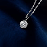 Diamond necklace on a dark blue fabric background