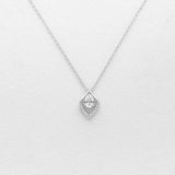 Silver necklace with a teardrop-shaped pendant on a light gray background