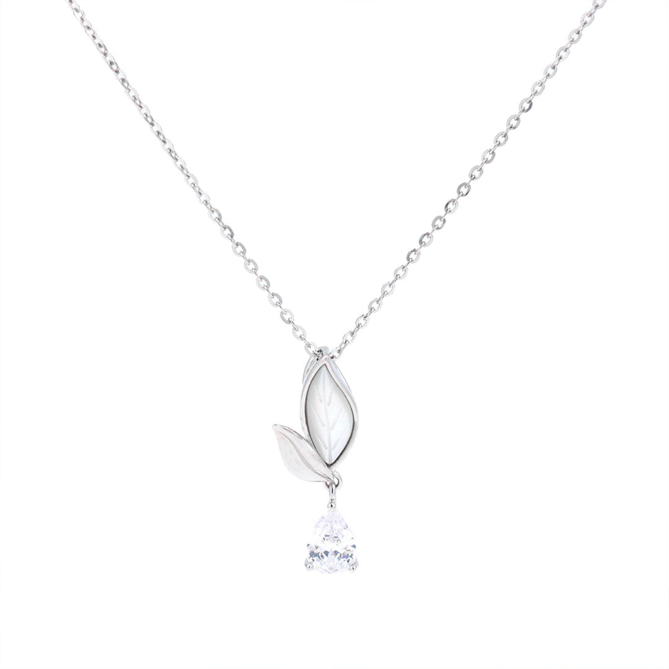 Silver necklace with a leaf and teardrop pendant on a white background