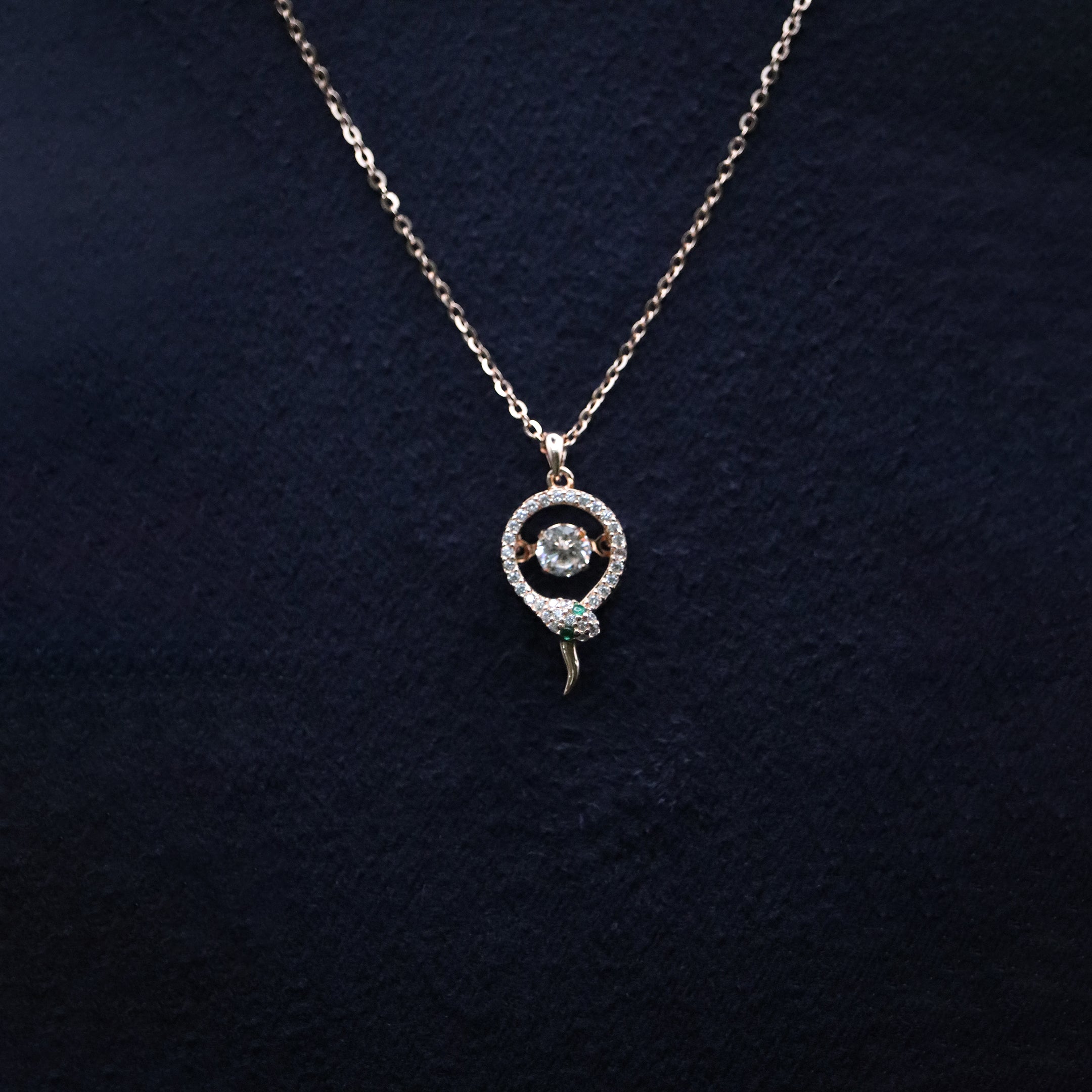 Necklace with a circular pendant on a dark textured background